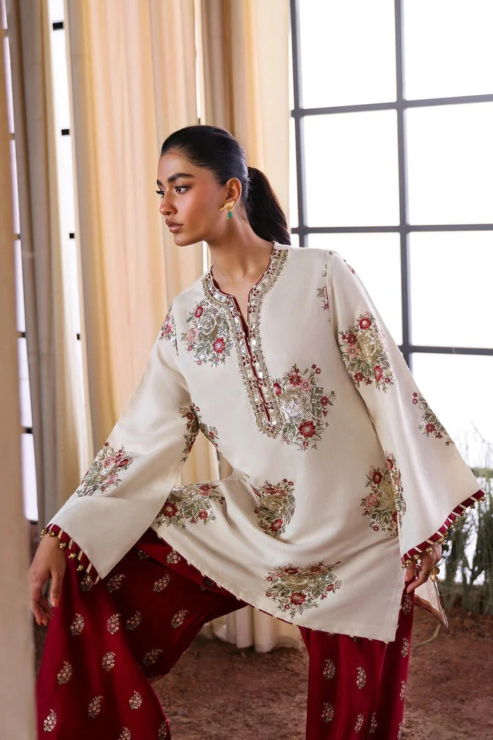 Ethnc - Off White pakistani fashion outfit in white, maroon tones.